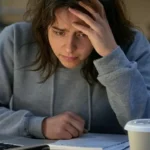 Image about a student struggling to do assignment